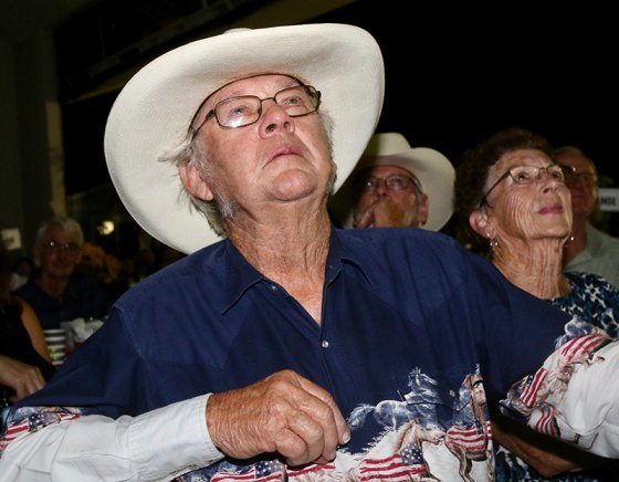 The 2018 Agriculturist of the Year, Pete Hanse, watches a video at the annual Kings County Salute to Agriculture Friday night in Lemoore.